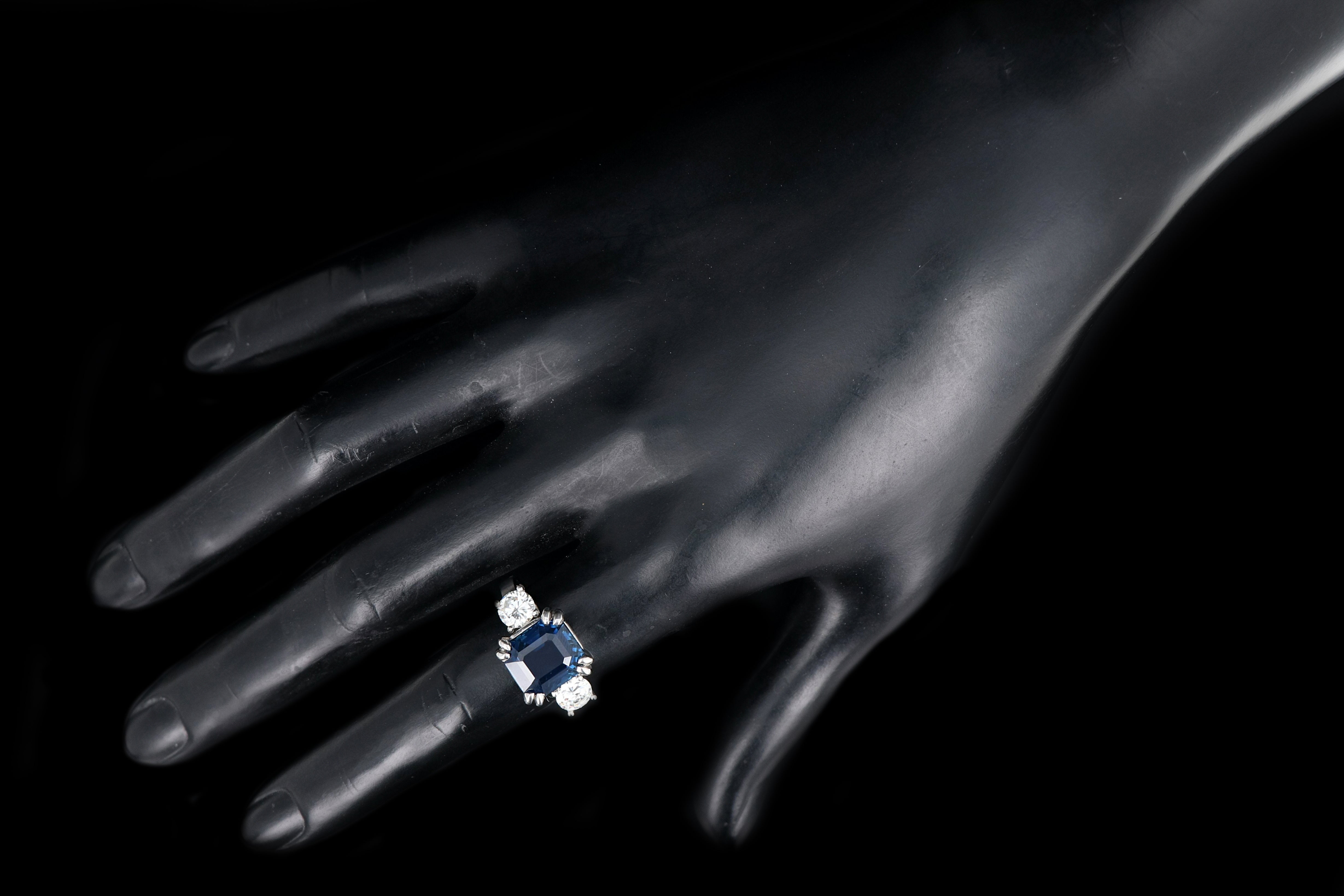 Modern Platinum AGL Certified 7.88 Carat Emerald Cut Sapphire and GIA Certified Diamond Ring - Queen May