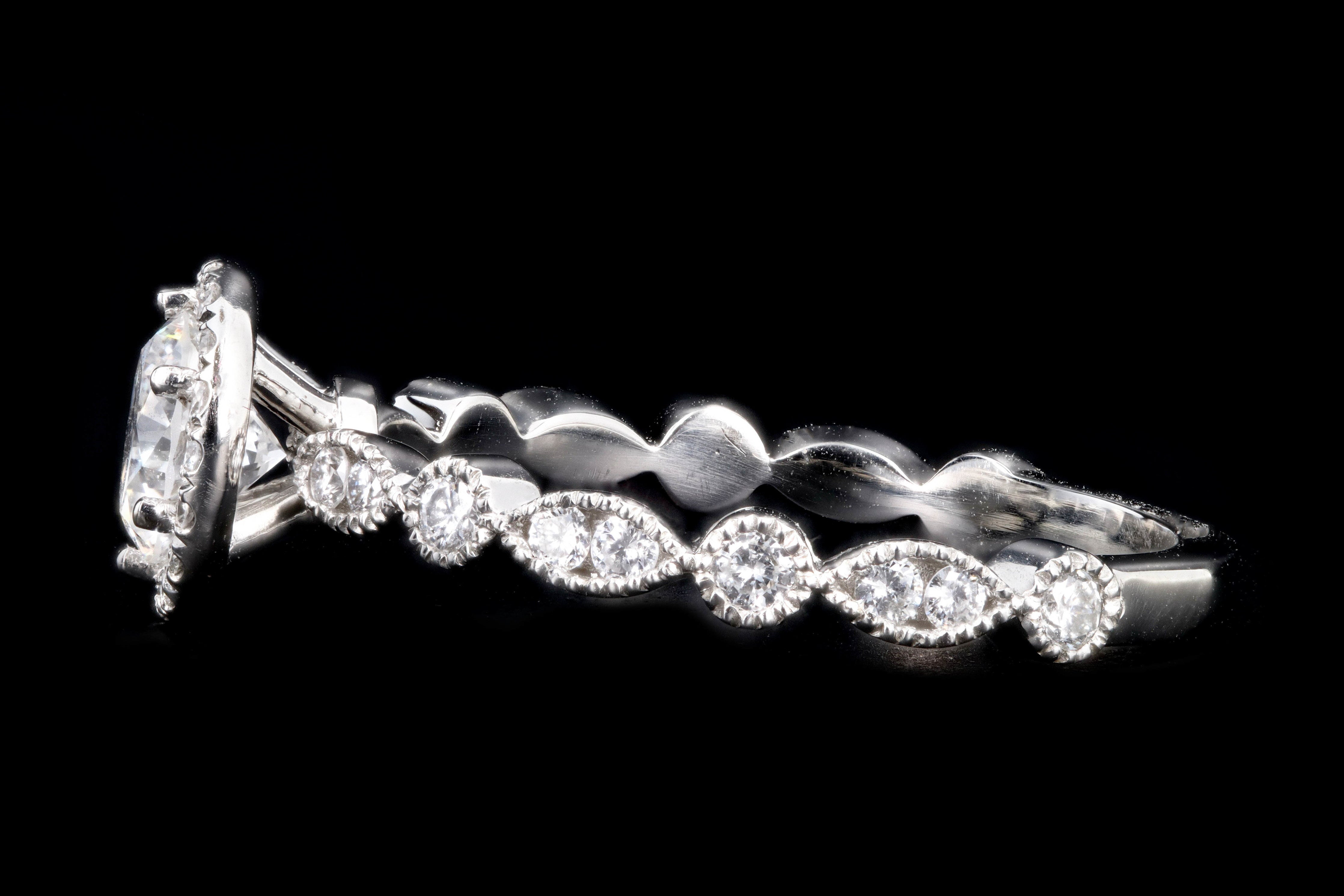 New Platinum .67 Carat Round Brilliant Diamond Halo Engagement Ring - Queen May
