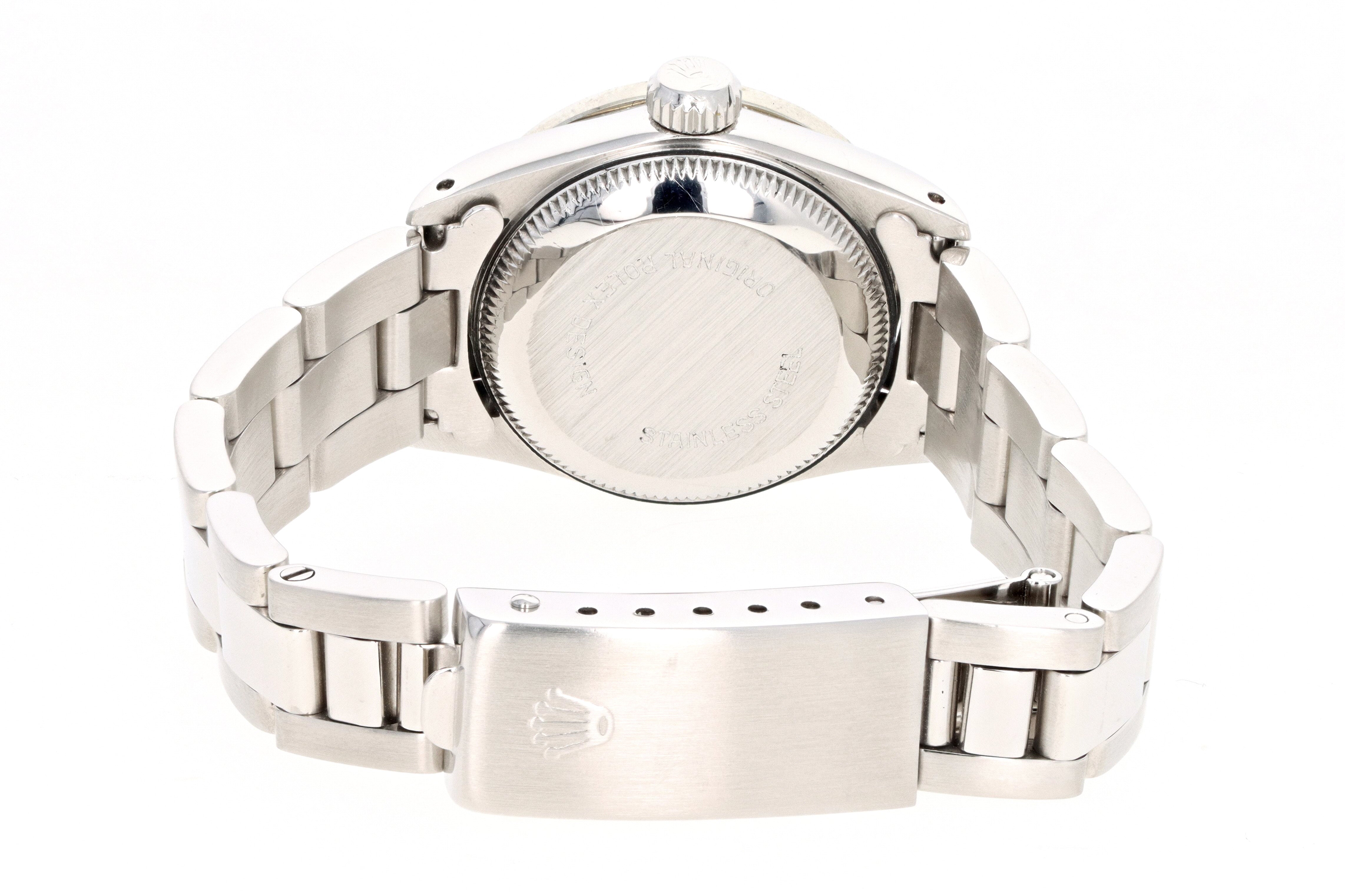 Rolex Oyster Perpetual Model 67230 - Queen May